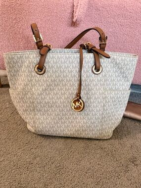 Michael Kors Cream Monogram Tote with Brown Leather Straps